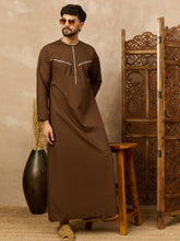 Men’s Brown Thobe with Stylish Contrast Piping Design